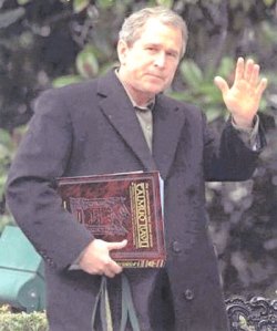 George Bush holding the Talmud